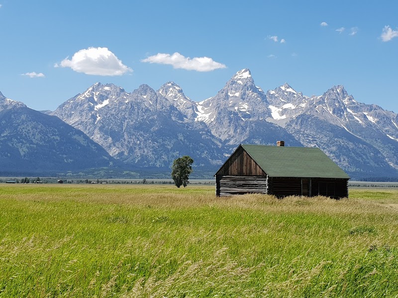 Majestic Peaks of Grand Teton surrounding landscape
