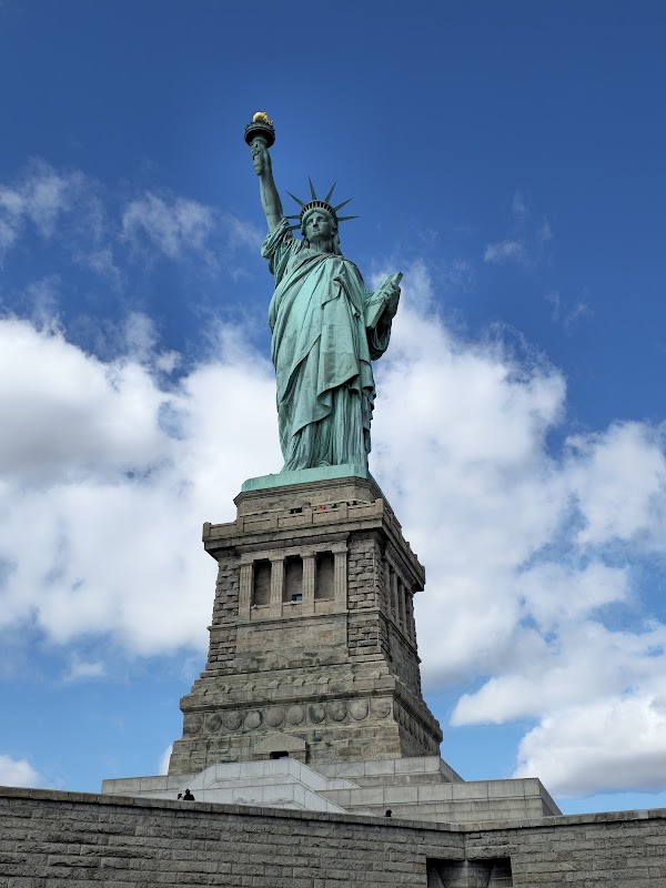 Statue of Liberty and Ellis Island surrounding landscape