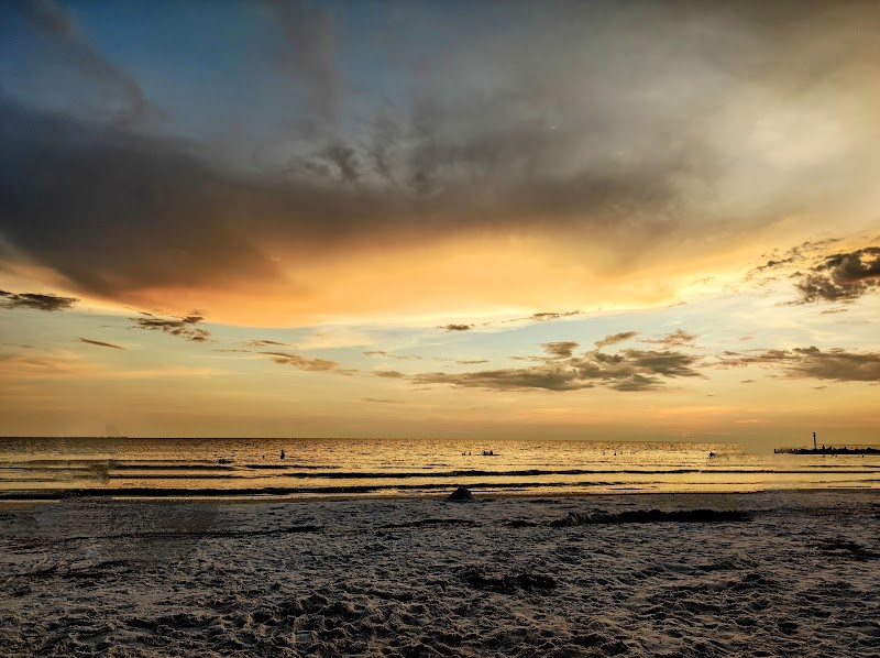 Sunlit Shores of Honeymoon Island State Park surrounding landscape