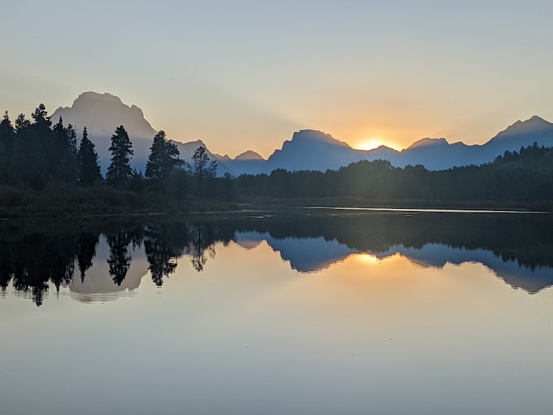Reflective Beauty at Oxbow Bend surrounding landscape