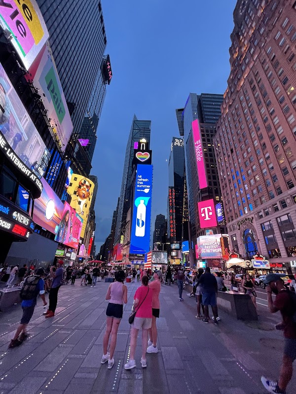 Bright Lights of Times Square surrounding landscape