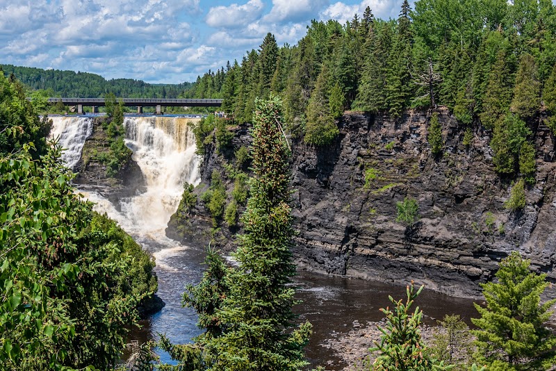 Majestic Cascades of Kakabeka Falls surrounding landscape