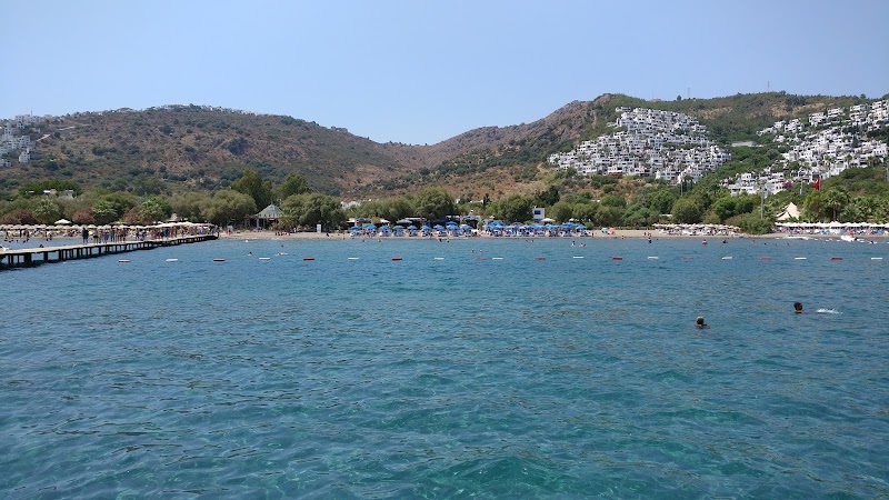 Relaxing by the Azure Waters of Deve Beach - Deve Beach