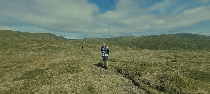 Majestic Peaks: Tolmount's Wilderness surrounding landscape