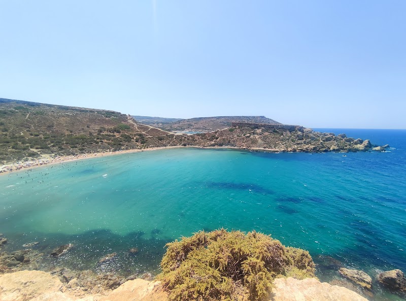 Discover the Serenity of Għajn Tuffieħa surrounding landscape