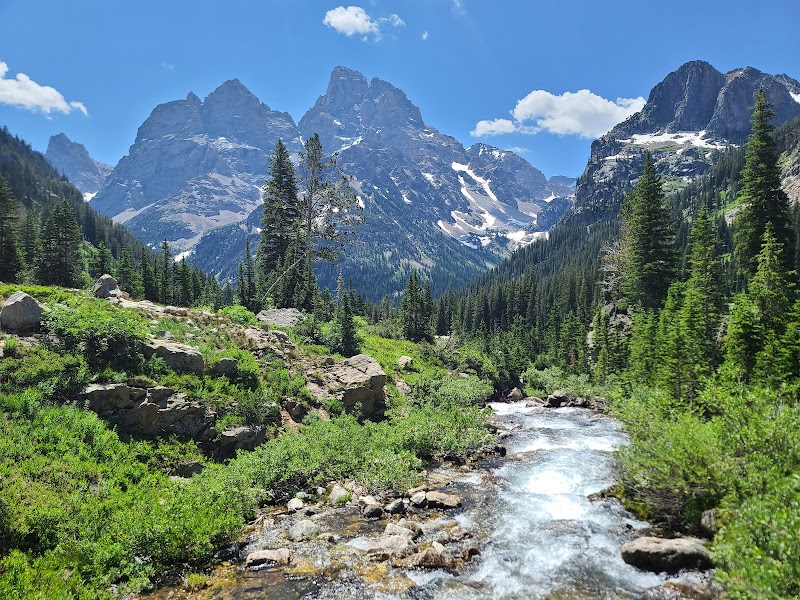 Majestic Peaks of Teton Range surrounding landscape