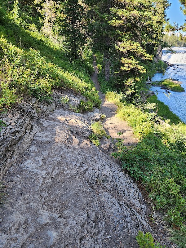 The Rush of Cave Falls surrounding landscape