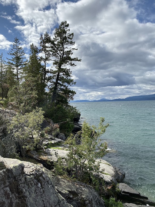 Nature's Cascade: Bigfork's Majestic Waterscape surrounding landscape