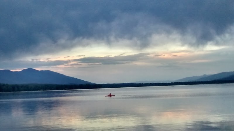 Tranquil Waters of Swan Lake surrounding landscape