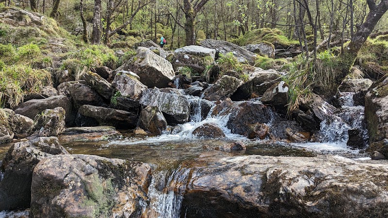 Discover the Majestic Steall Waterfall surrounding landscape