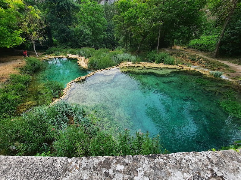 Waterfalls of Wonder: Cascada de Orbaneja del Castillo surrounding landscape