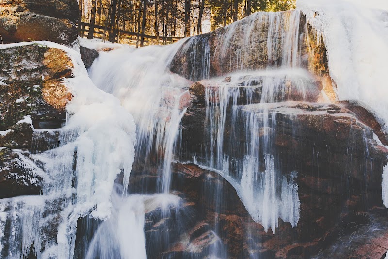Charming Cascade at Avalanche Falls surrounding landscape