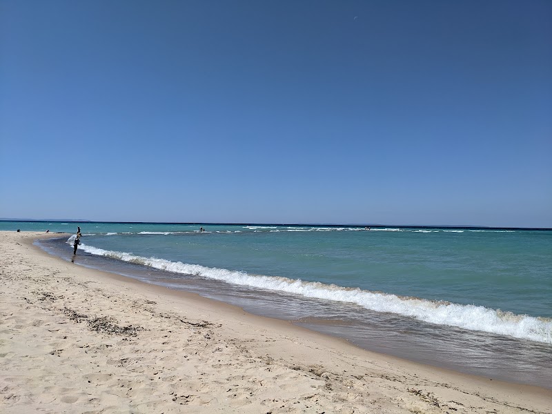 Serene Lakeshore Escape at Onomonee Road Beach surrounding landscape