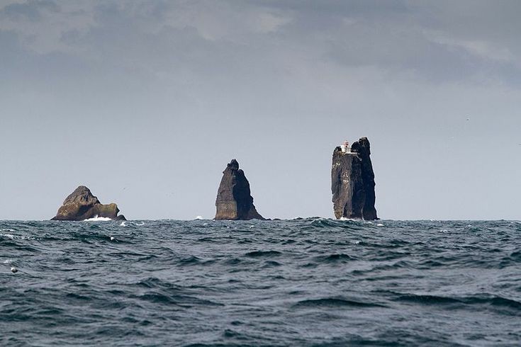 Dramatic Coastal Rock Formations & Thridrangar Lighthouse, Southern Iceland - Thridrangar lighthouse (Southern Iceland)